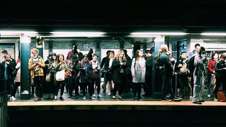 People waiting at a subway station