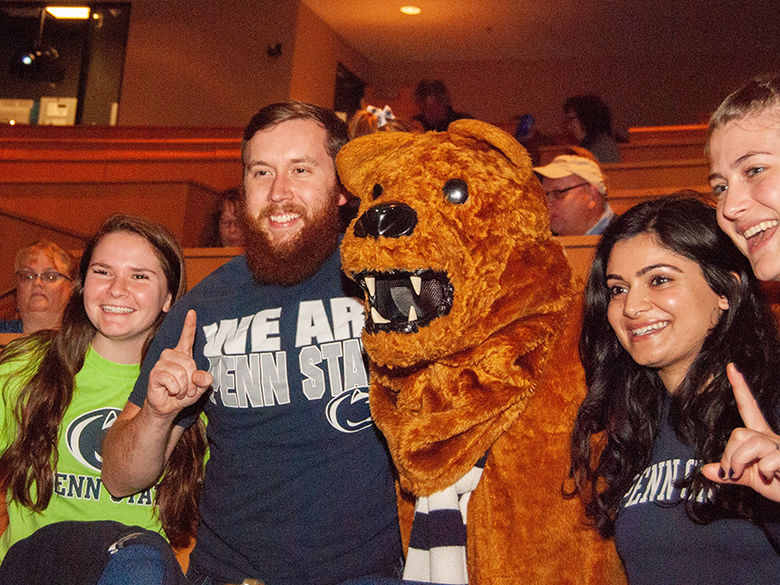 Alumni pose with the Nittany Lion at the Penn State Great Valley Alumni Awards