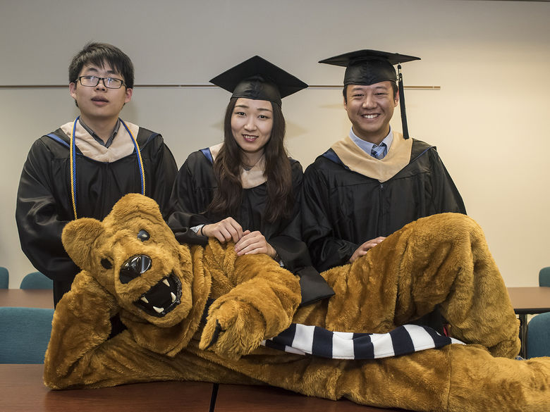 Photo of grads with Nittany Lion mascot