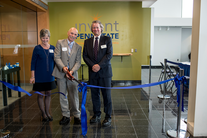 Marybeth DiVencenzo, Neil Sharkey, and James Nemes cut the ribbon to inaugurate the REV-UP Center for Entrepreneurship