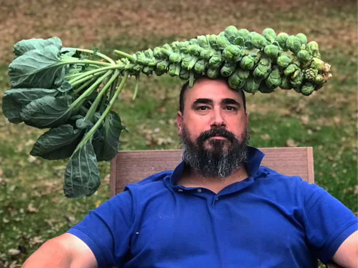 Ben Walmer with a crop of brussels sprouts on his head