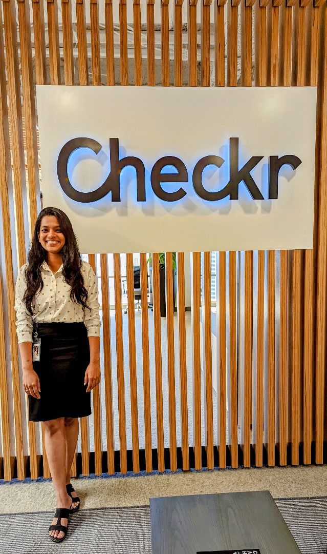 Namratha Sri Mateti in front of a Checkr sign