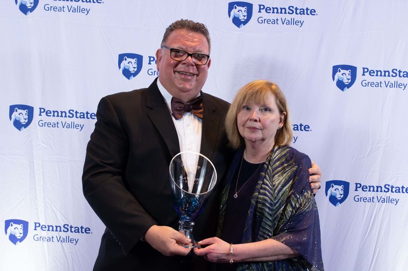 Joseph and Marilyn Henry with a Platinum Circle vase