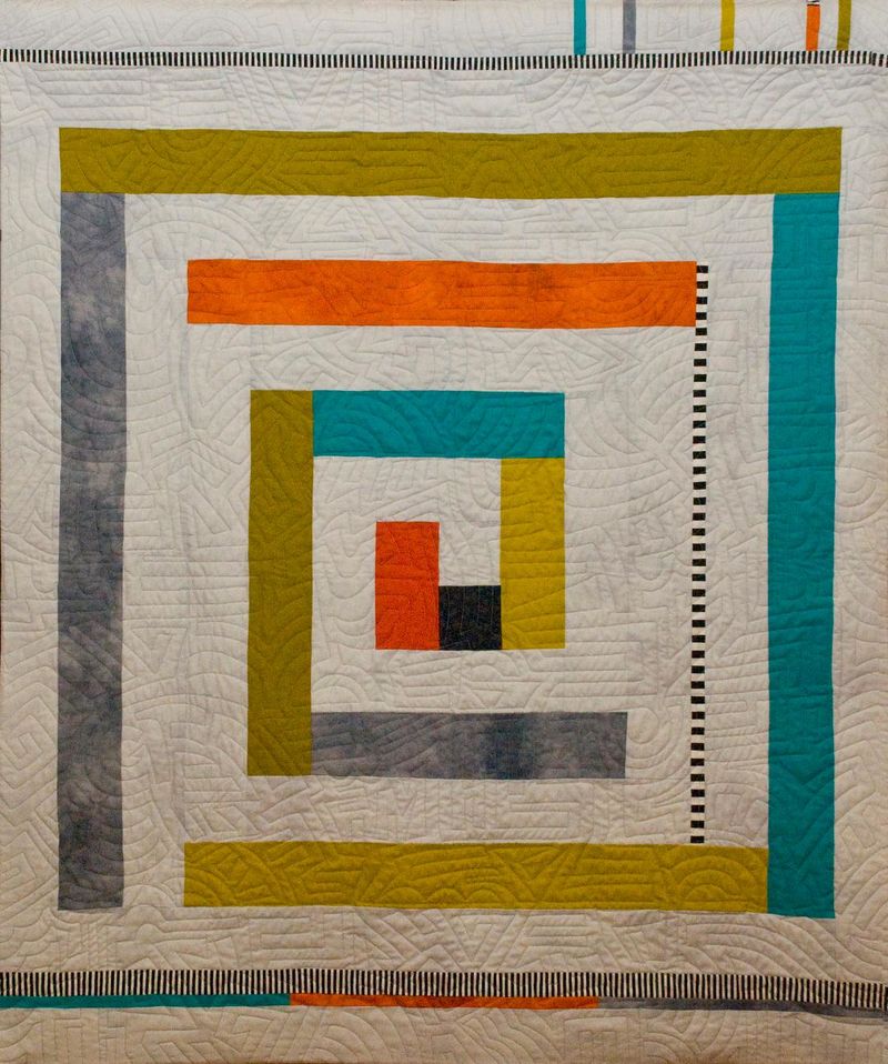A quilt with a spiral pattern