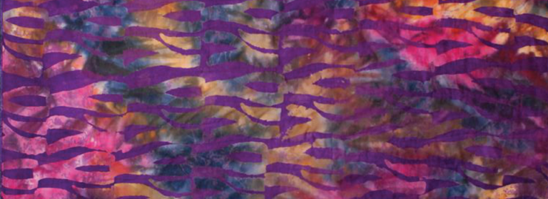 Tye dye with a purple pattern on top