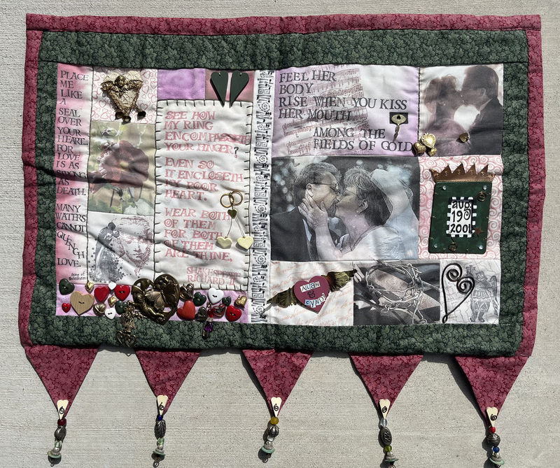 A quilt with words, heart buttons, and wedding photos