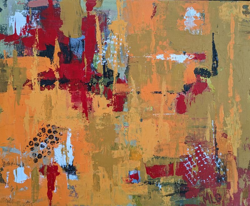 An abstract painting in reds and oranges