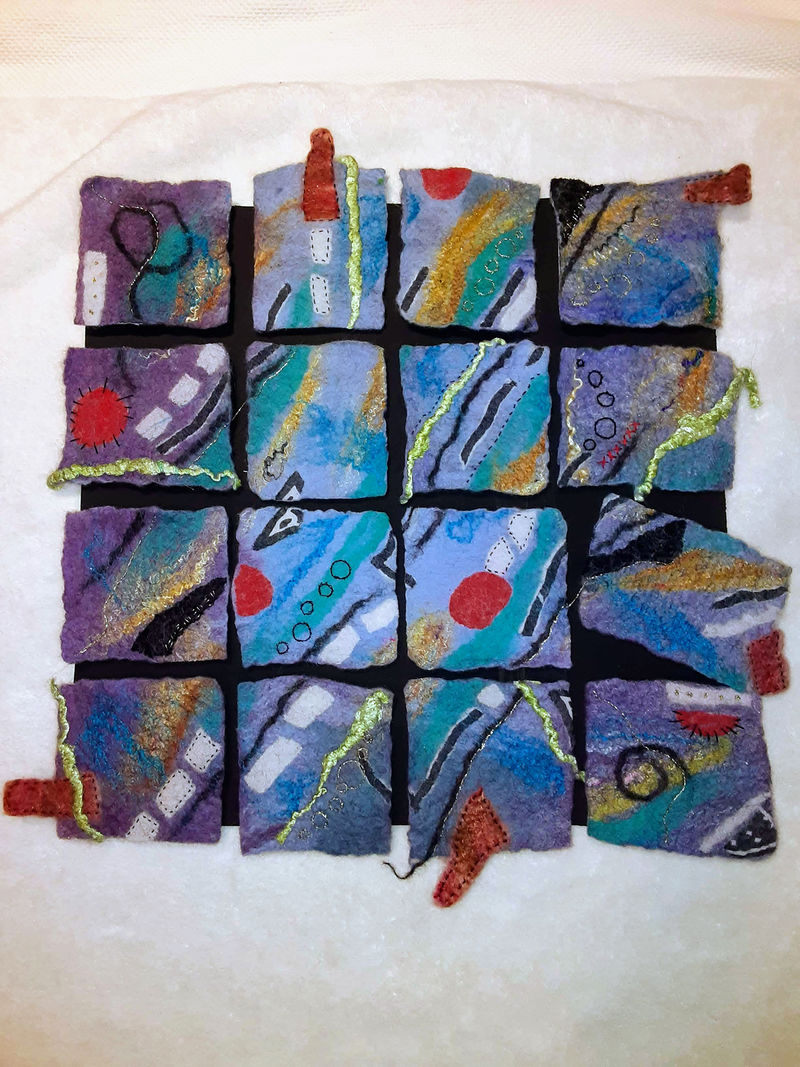 Artwork made up of smaller fabric squares