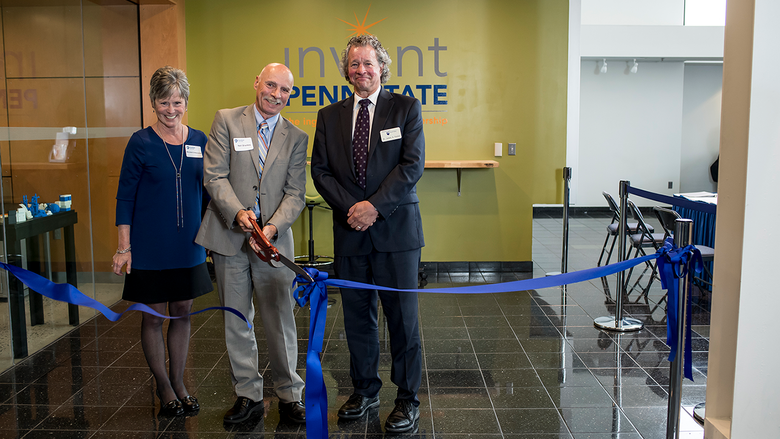 Marybeth DiVencenzo, Neil Sharkey, and James Nemes cut the ribbon to inaugurate the REV-UP Center for Entrepreneurship
