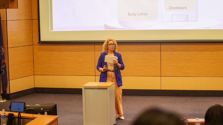 woman speaking at podium