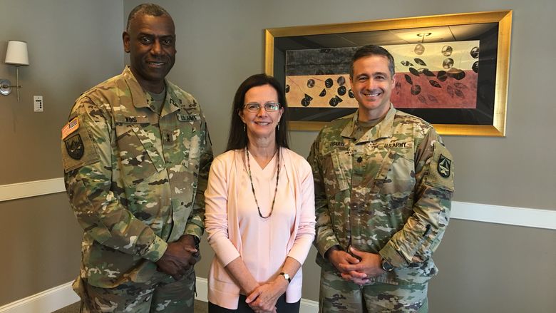 Major General Cedric Wins, Kathryn Jablokow, and Lieutenant Colonel Manuel “Manny” Ugarte standing together