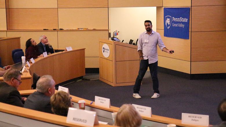 Raghav Hardas pitches his app, Squawkr, to a panel of judges at Penn State Great Valley's Lion Cage competition