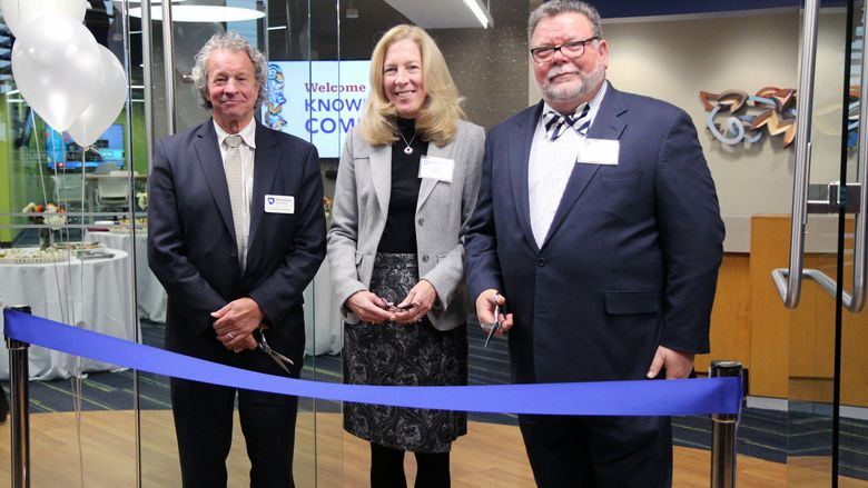 James Nemes, Mary Massung, and Joe Henry before cutting the ribbon to officially open the Knowledge Commons