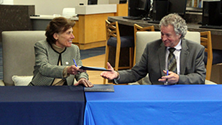 Representatives from Penn State Great Valley and Immaculata University signing an agreement at the Penn State Great Valley campus