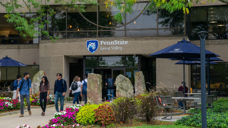 Students walk out of the Main Building at Penn State Great Valley
