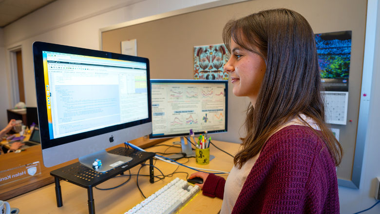 woman sitting at computer
