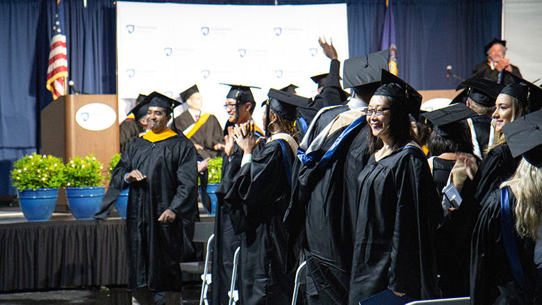 A group of graduates standing