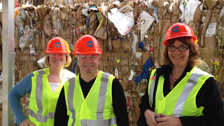 Staff at recycling plant
