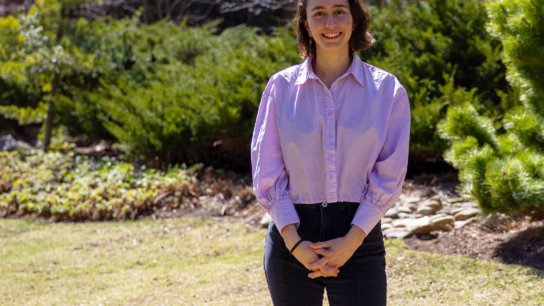 person standing in garden area