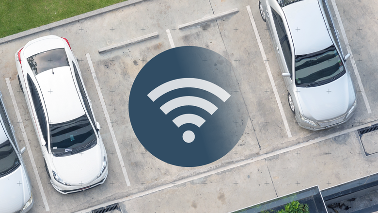 Image of parked vehicles with Wi-Fi symbol