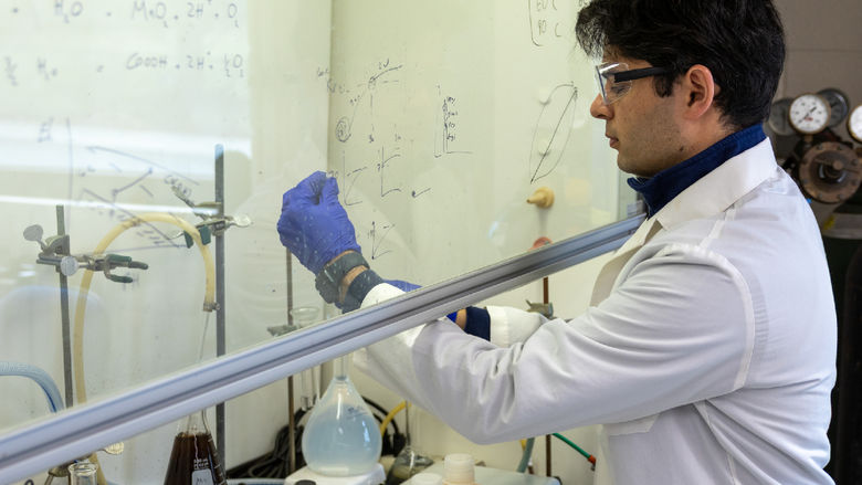 person in lab conducting research