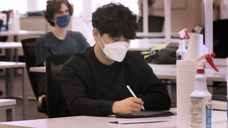 students in class with masks