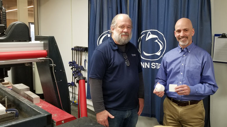 Wayne Frick and Dennis Wozniak pose with the Chirpsounds prototype
