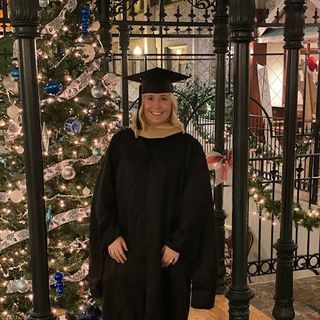 Brooke Schneider in graduation regalia