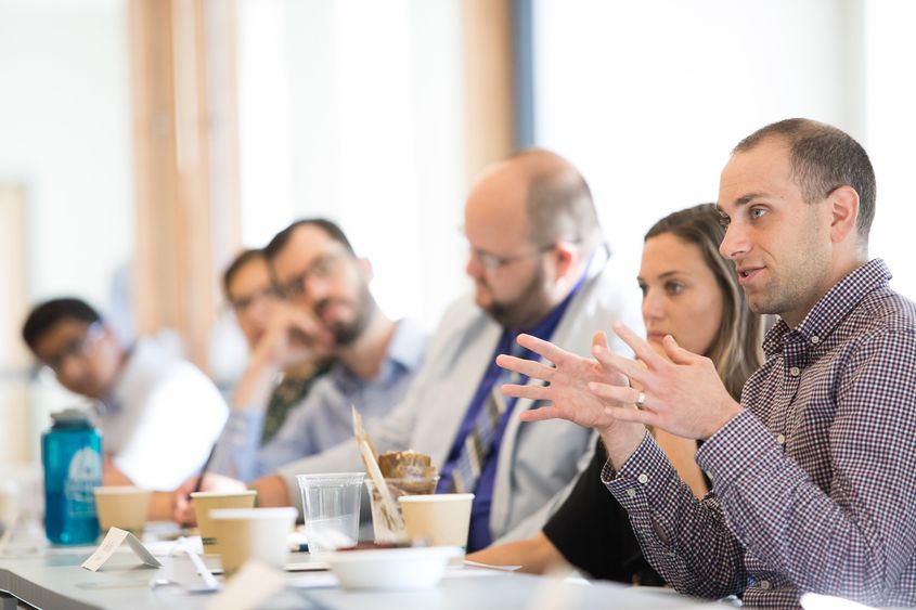 A discussion taking place at a Penn State at The Navy Yard event