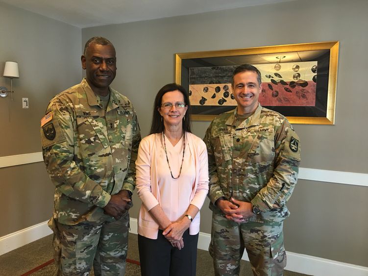 Major General Cedric Wins, Kathryn Jablokow, and Lieutenant Colonel Manuel “Manny” Ugarte standing together