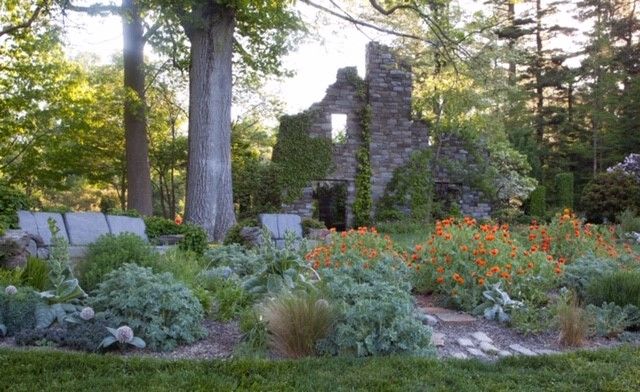 Stone wall and blooming garden at Chanticleer