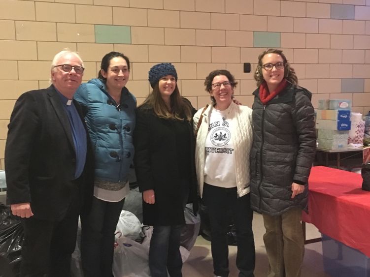 Members of the Great Valley Alumni Society pose with representatives from Ann's Heart