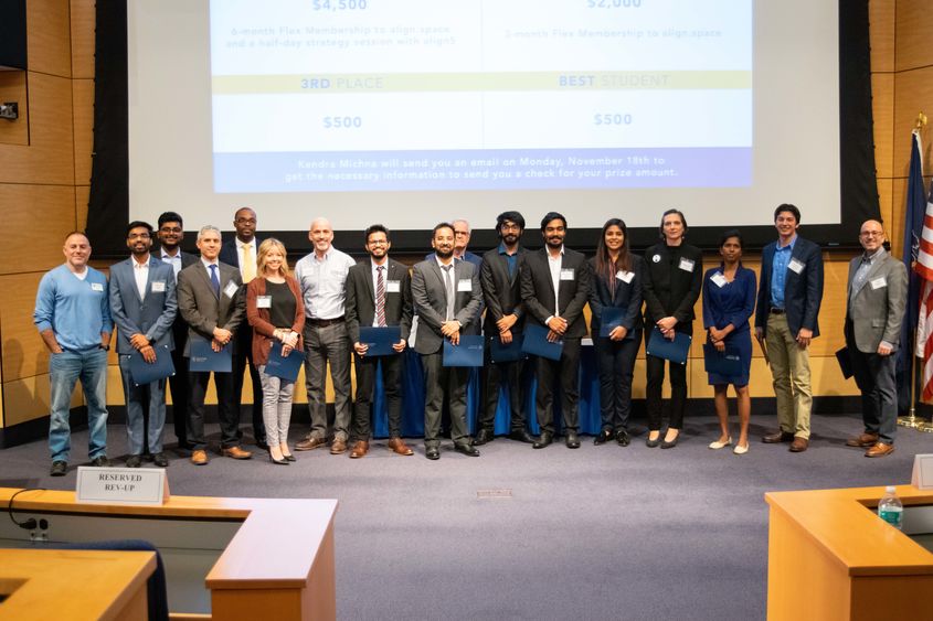 The 2019 Lion Cage presenters standing at the front of the auditorium