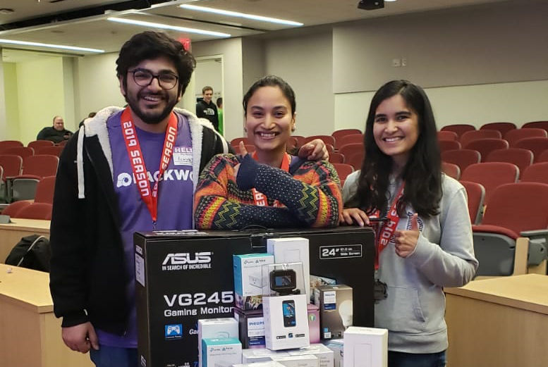 Three Penn State Great Valley data analytics students at West Chester Unviersity's hackathon