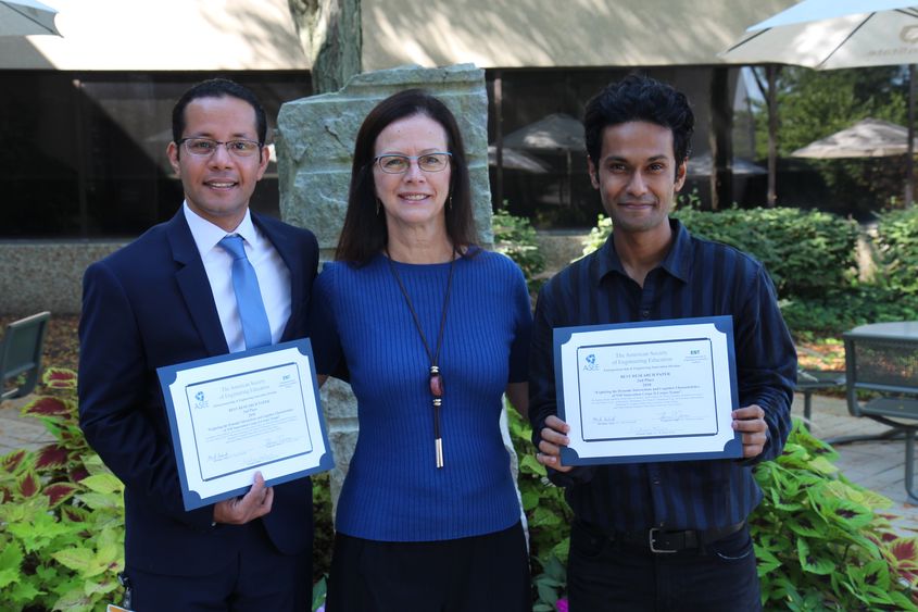 Penn State Great Valley graduate students Mohamed Megahed and Pratik Pachpute show off their ASEE awards with professor Kathryn Jablokow