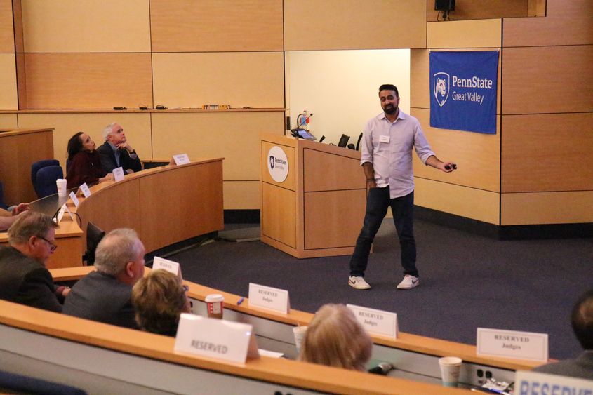 Raghav Hardas pitches his app, Squawkr, to a panel of judges at Penn State Great Valley's Lion Cage competition