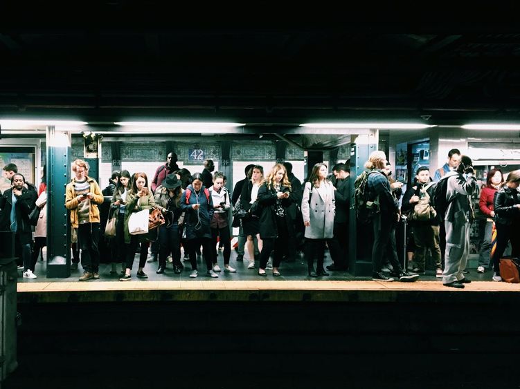 People waiting at a subway station