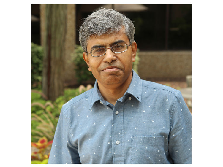 Headshot of Partha Mukherjee, smiling